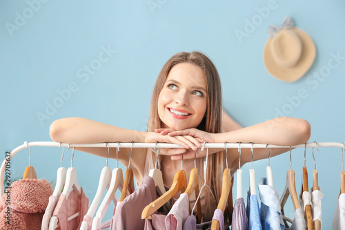 Young woman standing near c...