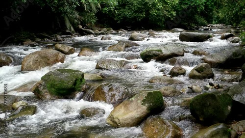 Lot of water flow between the rock at Hutan Lipur Sungai Sedim. photo