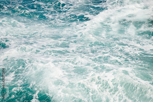 Natural background blue sea with waves, azure clear water beach