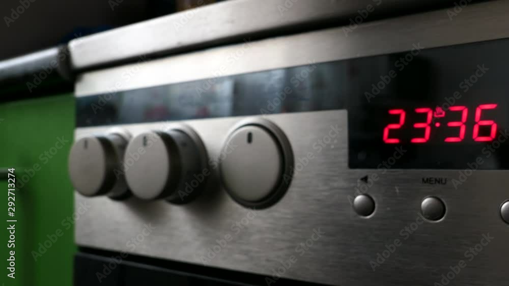 Electric Stove Knob And Time Display Panning Slider Shot. Electric Stove Knob And Time Display Panning Slider Shot.