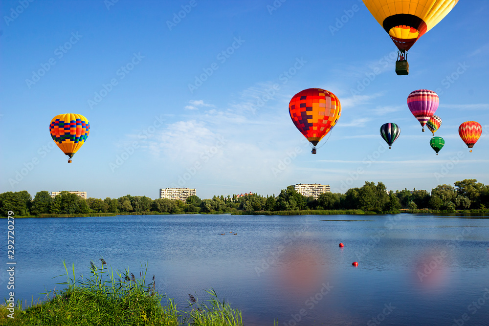 Balloon flying over the lake.