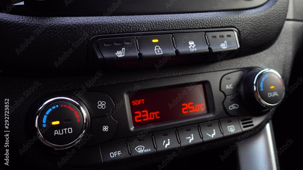 Man presses a button closing a car door. Man presses a button closing a car door.