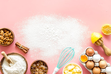 Baking mockup. Dough ingredients on pink background top view space for text