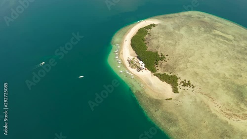 Starfish Island, Puerto Princesa, Palawan. Island hopping Tour at Honda Bay, Palawan. An island of white sand with mangroves. Atoll with a white island, view from above.