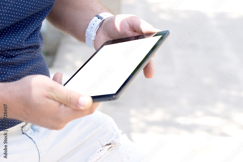 Mockup image screen tablet. Men hand holding texting using tablet at desk, with copy space, white blank space for advertise text. Concept for contact business, people communication, technology device Mockup image screen tablet. Men hand holding texting using tablet at desk, with copy space, white blank space for advertise text. Concept for contact business, people communication, technology device