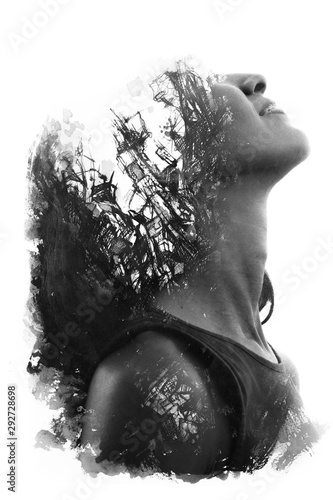 Paintography. Double Exposure portrait of a young woman with head titled backwards combined with hand drawn ink painting, black and white