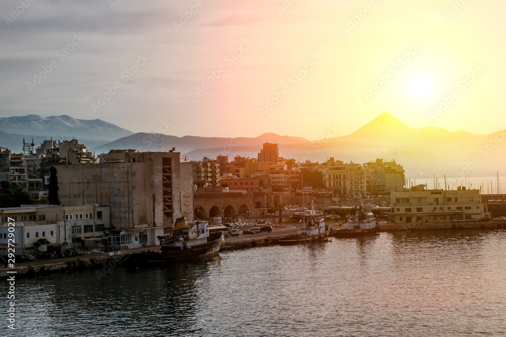 View of the ships in the port of Heraklion in Crete at sunset