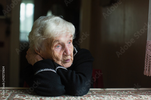 Elderly woman at home. Taking care of lonely old pensioners.