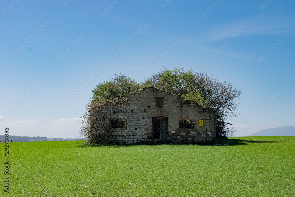 Mysterious abandoned isolated House on the green grass - Surreal Stock ...