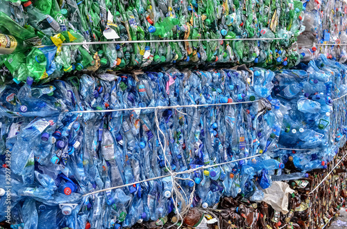 Fotografía Green plastic PET bottles pressed in bales for recycling