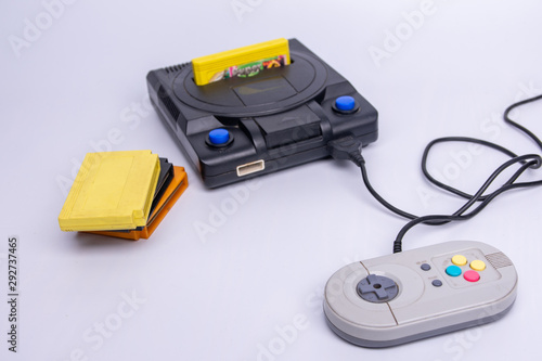 Old game console on a white background. Place for text