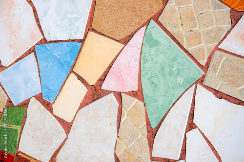 Colorful ceramic mosaic floor. Creative recycled mosaic top view photo. Bathroom or kitchen floor design idea. photo