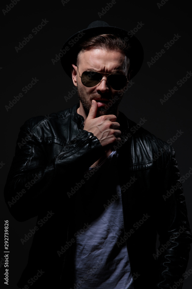 Obraz premium seductive fashion model wearing leather jacket