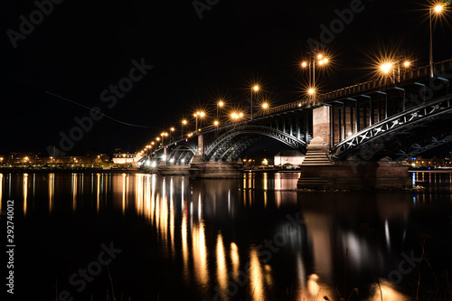 Lightreflections at Rhine / Rhein river at an old bridge in Mainz near Frankfurt am Main, Germany.