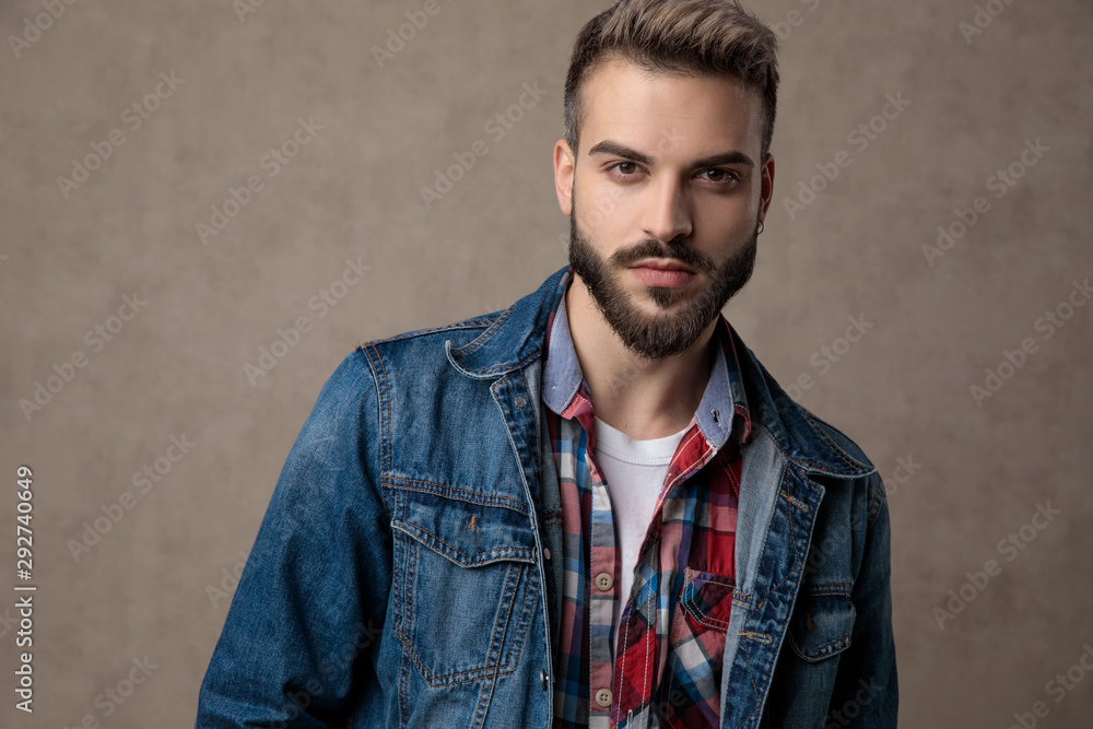 Fototapeta premium casual young fashion model wearing blue denim jacket