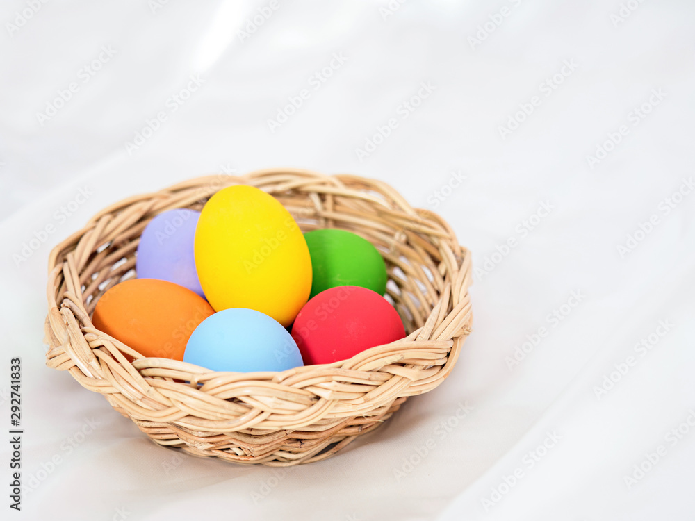 fresh eggs on wooden box with colorful painted on outer surface fresh eggs on wooden box with colorful painted on outer surface