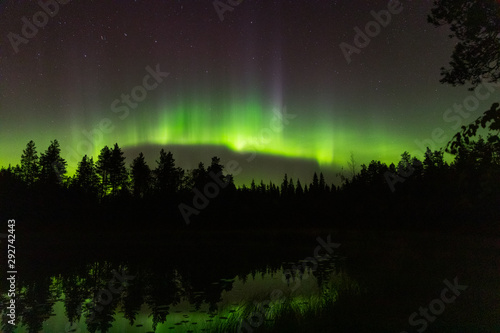 Aurora borealis by the lake