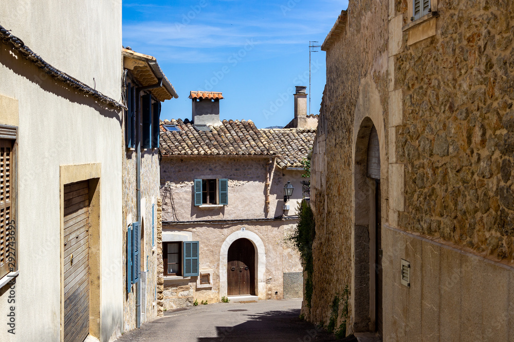 Fototapeta premium Small roads and houses in the village Campanet in the north of Mallorca