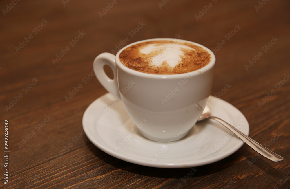 cup of coffee on wooden table. Favorite Morning drink breakfast. With copy space for text. cup of coffee on wooden table. Favorite Morning drink breakfast. With copy space for text.
