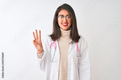 Chinese doctor woman wearing coat and pink stethoscope over isolated white background showing and pointing up with fingers number three while smiling confident and happy.