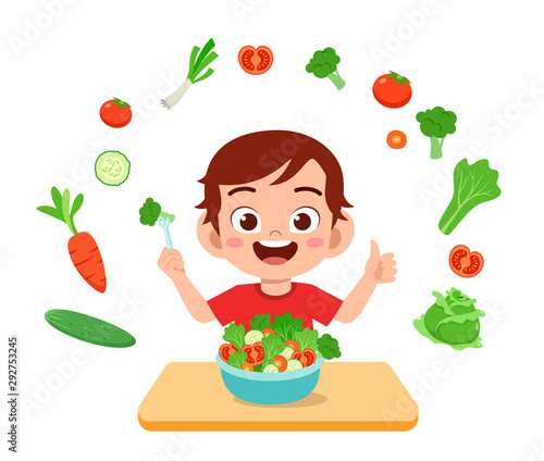 cute happy kid eat salad vegetable fruits
