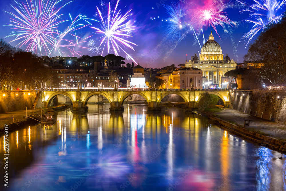 Fireworks display over the Vatican city with Saint Angelo Bridge, Rome. Italy