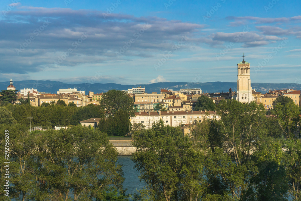 Old Valence city view with the central cathedral, river on the foreground and mountains on the background.