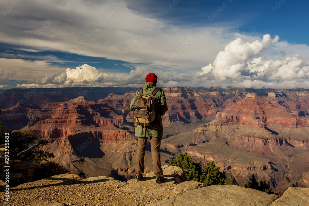 A hiker in the Grand Canyon National Park, South Rim, Arizona, USA. A hiker in the Grand Canyon National Park, South Rim, Arizona, USA.