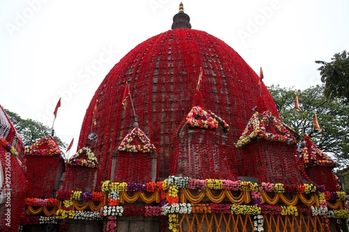 ancient temple of hindu goddess Kamakhya decorated with flowers photo