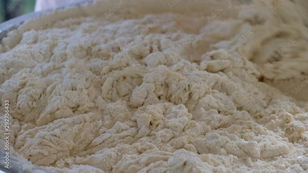 pizza base being made and rolled from handmade dough pizza base being made and rolled from handmade dough