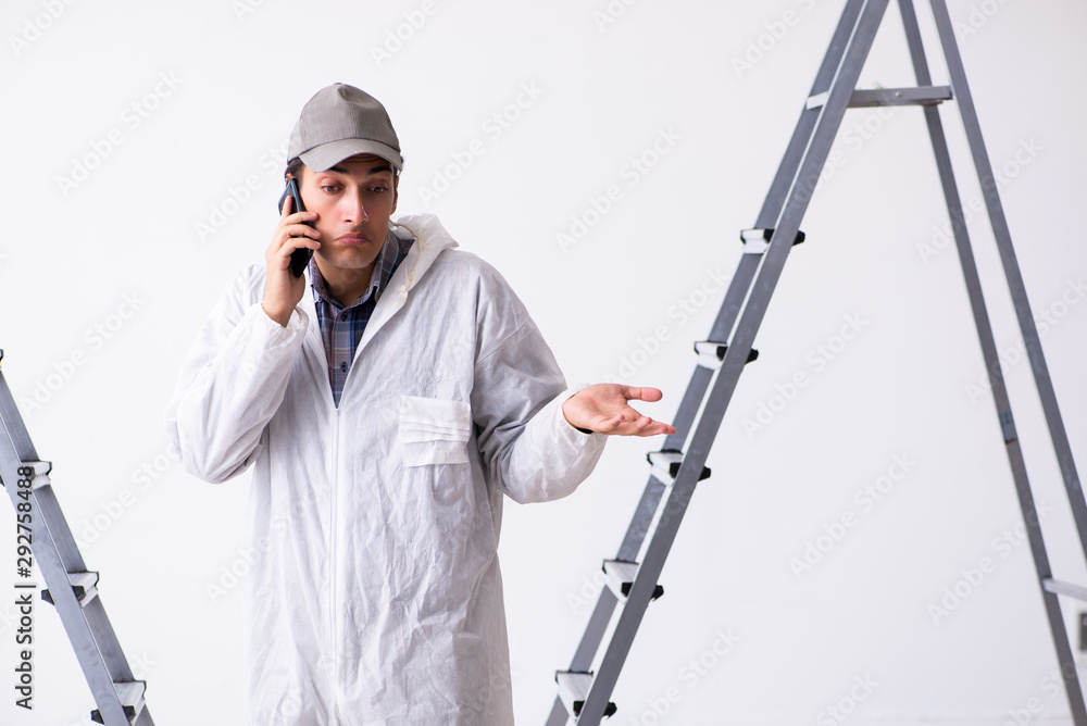 Painter working at construction site Painter working at construction site