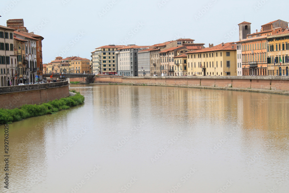 The historic center of pisa with its building colorful facades and Arno river, Tuscany, Italy