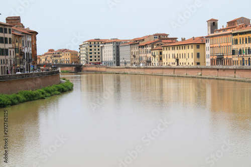 The historic center of pisa with its building colorful facades and Arno river, Tuscany, Italy