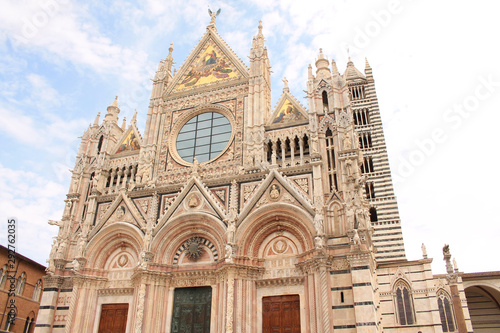 The huge majestic cathedral of Saint Mary of the Assumption on the Duomo Square, a medieval church in Siena, Tuscany, Italy