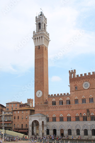 Piazza del Campo with the Pubblico palace and Mangia tower , the principal public space of the historic center of Siena, Tuscany, Italy. It is regarded as one of Europe's greatest medieval squares