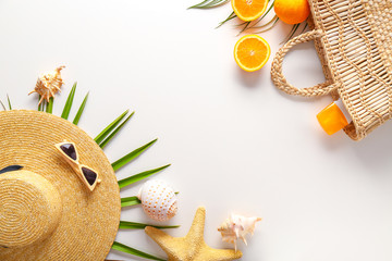 Summer composition with beach accessories on white background