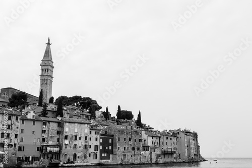 The old town of Rovinj on a hilly peninsula  surrounded by the Adriatic Sea in Croatia.