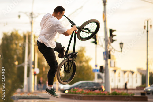 The guy in the air with a BMX bike.