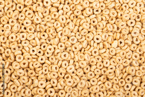 Fototapeta Cheerios, breakfast cereal background , top view
