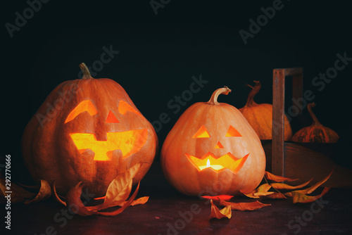 Two jack-o'-lanterns with g...