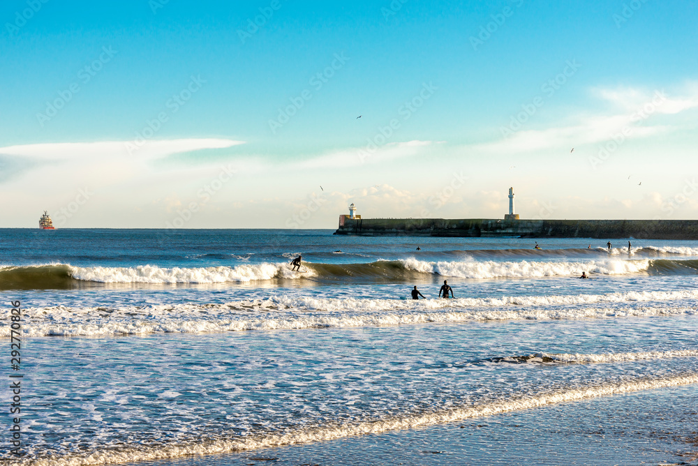 Surfers paradise on Aberdeen beach in a beautiful sunny winter day, Scotland