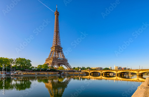 View of Eiffel Tower and river Seine at sunrise in Paris  France. Eiffel Tower is one of the most iconic landmarks of Paris