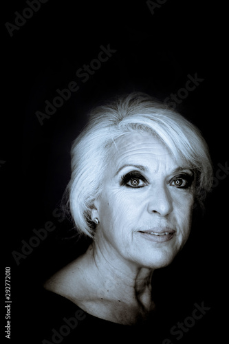 Attractive middleaged woman with white hair