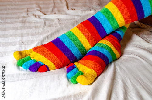 male legs in colorful lgbt socks