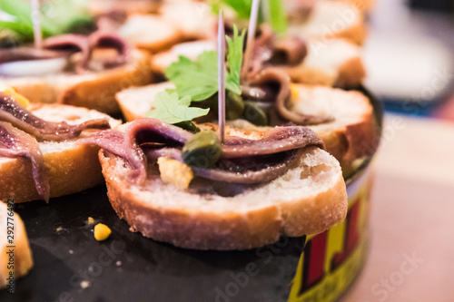 anchovy pintxos with boiled egg and capers. Spanish tapas called pintxos of the Basque country