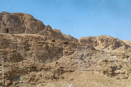 Caves in the Hills at Qumran National Park, Dead Sea Scrolls, Israel © Jill Clardy