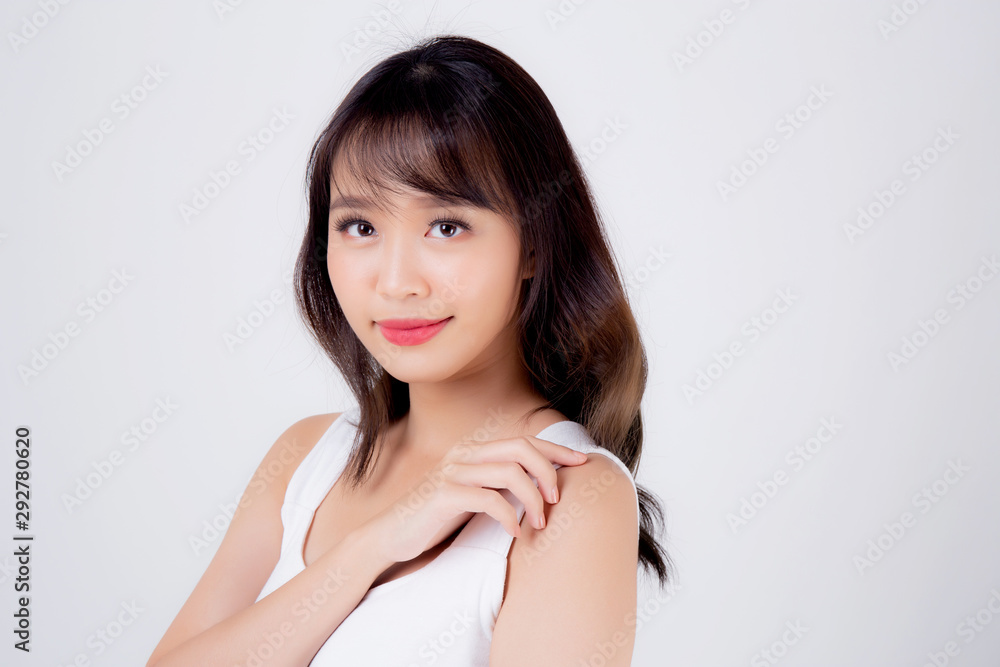 Beautiful woman asian makeup of cosmetic, beauty asia girl hand touch shoulder and smile attractive, face of beauty perfect with wellness isolated on white background with skin healthcare concept. Beautiful woman asian makeup of cosmetic, beauty asia girl hand touch shoulder and smile attractive, face of beauty perfect with wellness isolated on white background with skin healthcare concept.