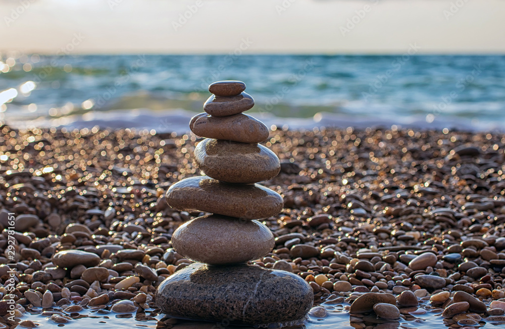Zen concept. The object of the stones on the beach. Meditation