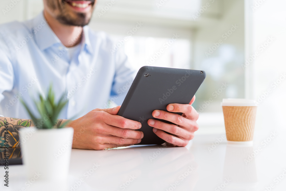 Close up of business man working using touchpad tablet Close up of business man working using touchpad tablet