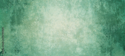 Old blue green background with distressed vintage texture and dark border grunge 